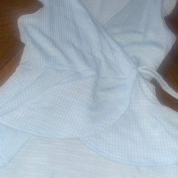 Peplum style Sleeveless shirt - Picture 5 of 5